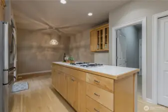 Abundant storage with this center island. Doorway leads to the laundry room and garage.