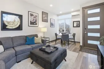 Main level is large enough for dining table in addition to eat-in counter space in kitchen.