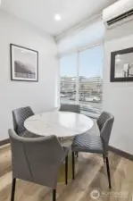 Dining space positioned off the living area, offering natural light and easy flow for modern living.