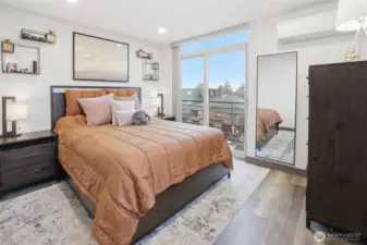 Primary retreat on upper level , Juliet balcony and mini-split for year-round comfort.