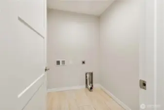 Separate laundry room.  Dryer hookup accommodates gas or electric version
