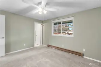 Primary bedroom with attached bathroom