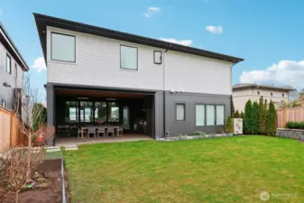 Flat fully fenced backyard can be enjoyed year round.