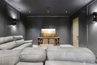 Home theater prewired for your home entertainment complete with wet-bar, wine cooler, and popcorn machine!