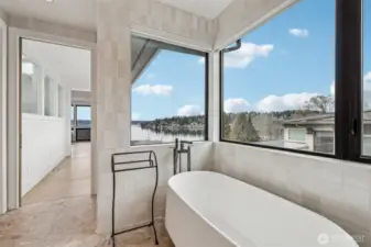 Opulent Primary Bath is roomy and bright, top off with a tranquil lake view!