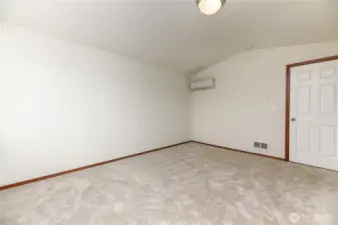 primary bedroom with ductless mini split