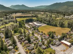 Expansive Centennial Park & Centennial Fields & Trail is just a block up the street offering baseball  diamond, extensive trail system, biking trail, playgrounds and acres of adventures. Three Forks Off  Leash Riverfront Dog Park is also less than 1/4 mile stroll.