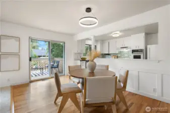 A slider off the dining area leads to the expansive deck.