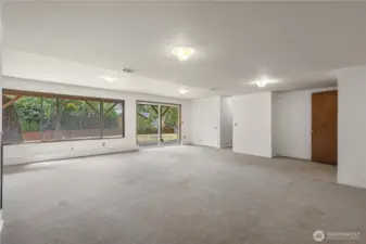 Large windows brighten the lower level. Great flex space for hobbies, play, or family room.