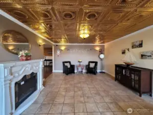 The lobby with a welcoming fireplace and seating start your experience after using a code to enter the building. The entire property is key free from the apartments to the mail boxes. No more replacing lost keys.