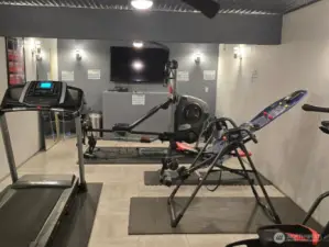 Back inside we have a small gym for the residence to use and it is used often.