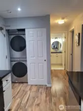 Here is what everyone loves in their unit, a full sized washer and dryer. When the bi-fold door covers the washer/dryer there is still a nice sized pantry for food etc.