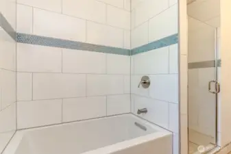 new tile shower and tiled bath tub