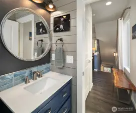 Fully remodeled main floor powder room.