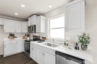 Photo is of a similar home. Colors and materials may vary.