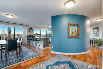 Cool architectural features like this curved wall add graceful visual interest and soft movement to the space.