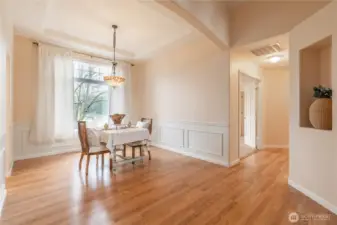 Dining Room easily turned into a more practical space such as study, libary, entertainment with bar or piano