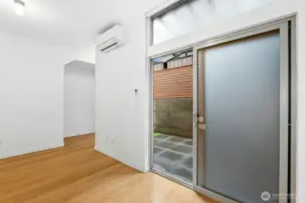 First level Bedroom/Bonus slider to the fenced yard.