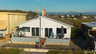 Waterfront beach side of the home.