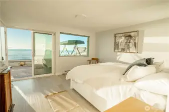 Primary bedroom with great view from the slider and window shown here.