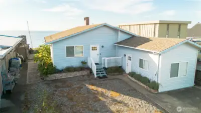 Front of the home along Sucia Dr.