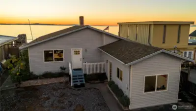 Front of the home with sunset beyond....