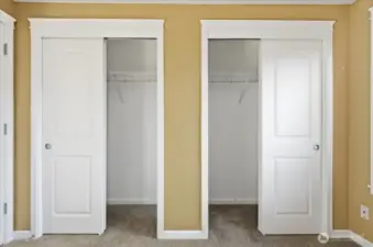 Primary Bedroom, w/ Ensuite 1/2 Bath & Double Closets