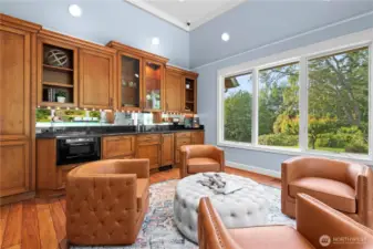 Whether hosting a lively gathering or  enjoying a quiet evening, this game room  provides an ideal setting for entertainment  and enjoyment.