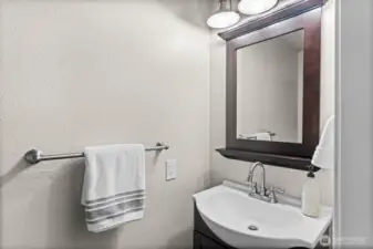 1/2 bath off laundry on main level
