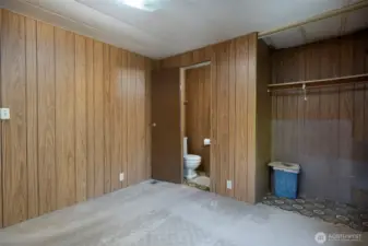 Half bathroom in primary bedroom.