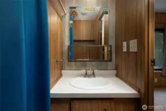 Primary half bathroom.