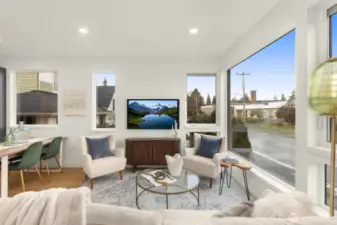 Bright and open, the living and dining areas flow seamlessly together, balancing functionality with modern design. Photos are of model home with similar fixtures & finishes.