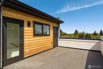 The expansive rooftop deck serves as a retreat, soak in the views.Photos are of model home with similar fixtures & finishes.