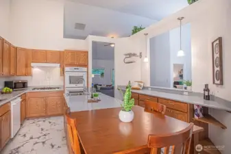 Double oven, gas cooktop, refrigerator, dishwasher, trash compactor and double sinks!