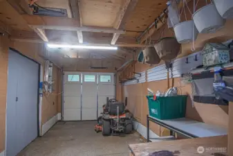 storage shed - riding lawn mower stays!
