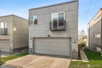 TWO CAR GARAGE off alley! Plus two more driveway parking spots.