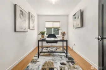 This den is located inside of the primary wing—perfect for a home office, baby nursery, or your dream tricked out closet.