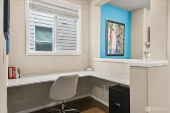 Built in desk between entry hall and the great room.