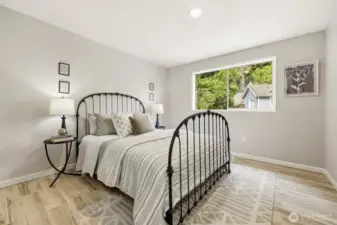 Main-level bedroom with abundant light