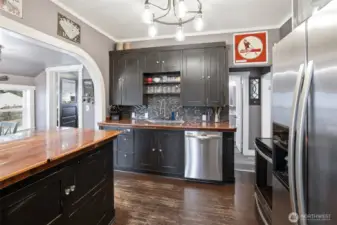 SS appliances with custom counter tops and well maintained original cabinets. So much charm.