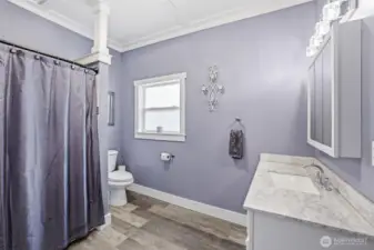 Nice large restroom next to primary bedroom.