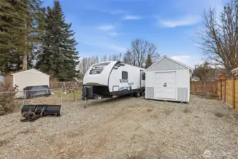 Another shed for storage - look at how much parking your have on this property!