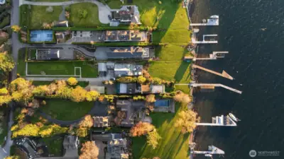 A blank canvas awaits: design your ideal waterfront retreat while enjoying summertime from the comfort of the perfectly updated bungalow ready for lakeside entertaining.