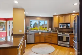 Spacious kitchen with ample cabinetry and prep space