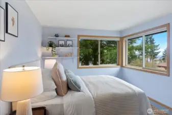 Light-filled 2nd bedroom with peaceful setting