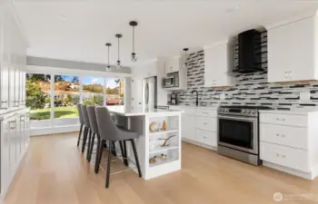 Primary Residence kitchen has tons of storage and extremely convenient work triangle. And, oh, so beautifully finished!