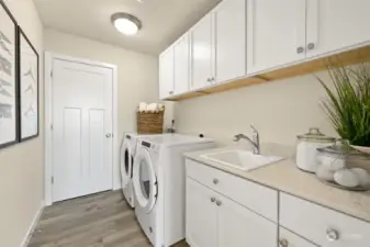 Beautiful laundry room with cabinets and sink - Washer and Dryer Inlcuded