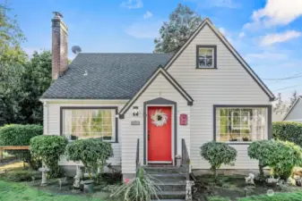 Eye stopping red door, decorating the front of the home beautifully