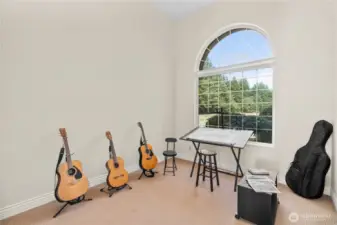 Office with views of the front yard.