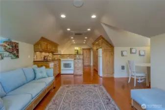 433 sq ft. ADU located above the garage equipped with a kitchen, and dining area